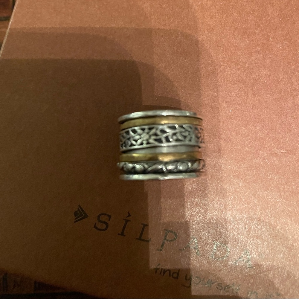 Silpada Sterling Silver and Brass Spinner Ring R2293. Box available